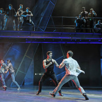Ready to rumble! It’s the classic tale of the Sharks versus the Jets in West Side Story, one of the greatest musicals ever, playing March 16-April 24, 2016 at the Paramount Theatre, 23 E. Galena Blvd. in downtown Aurora. Pictured, bottom, from left: Tony (Will Skrip) is held back by Diesel (Aaron Patrick Craven) as Bernardo (Adrian Aguilar) takes a swing at Riff (Jeff Smith). For tickets and information, go to ParamountAurora.com or call (630) 896-6666. Photo credit: Liz Lauren.